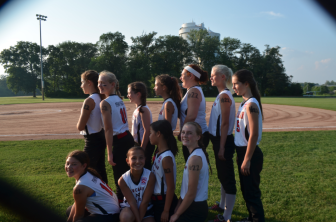 As a show of support for Carolina Welch, the girls had her #22 drawn on their left shoulders in marker, with the Roman numeral X, or 10, for Welch's age, drawn on their right. Credit: Sophia Welch