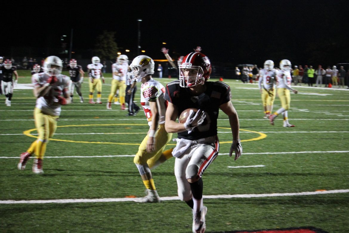 Second Half Surge Propels New Canaan Football Over Greenwich 40-16