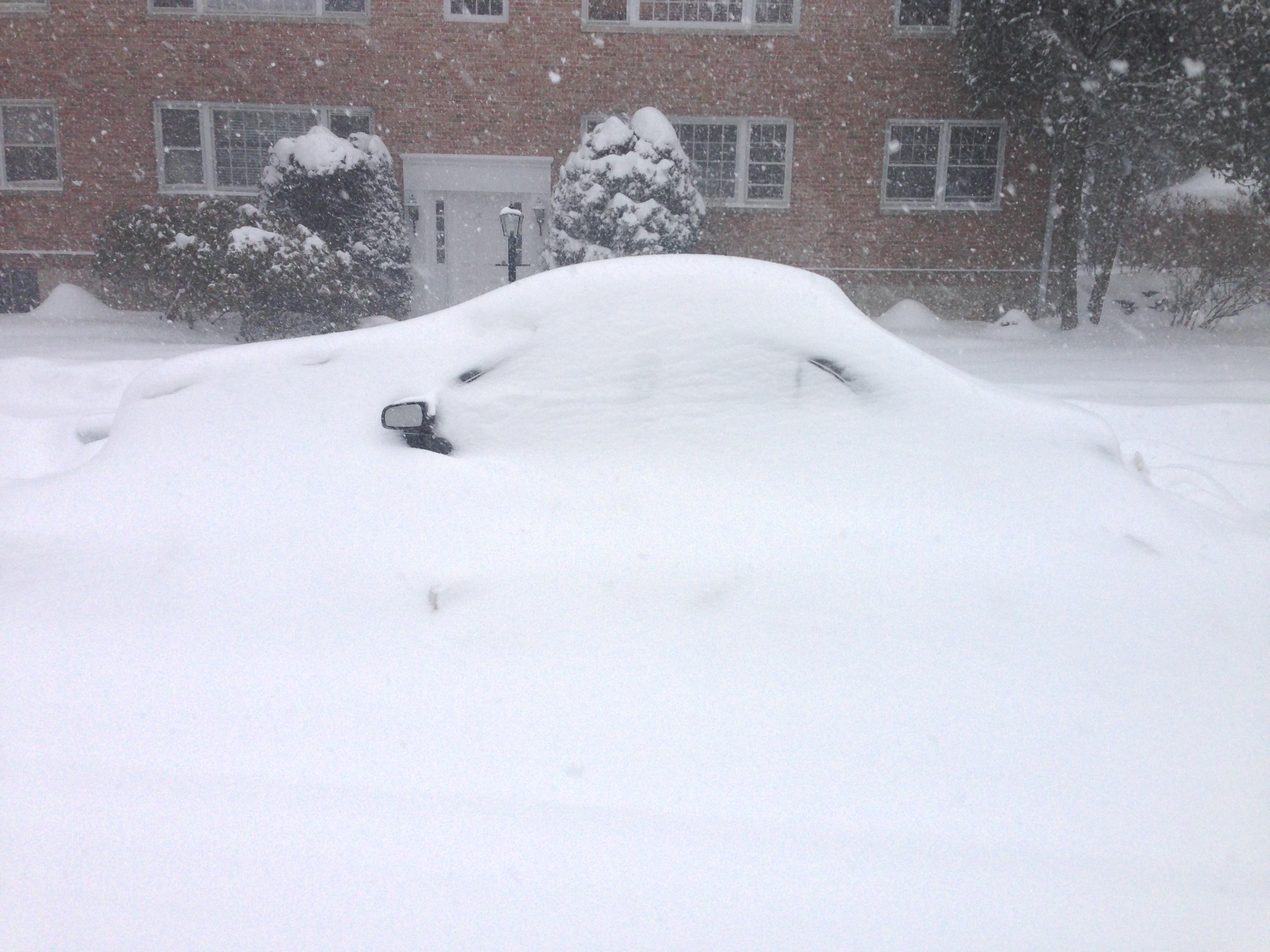 Car on Heritage Hill Road during Winter Storm Pax, Feb. 13, 2014. Credit: Terry Dinan