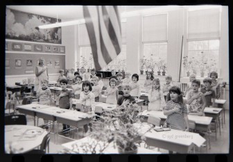 Classic Syd Greenberg photo of Genevieve Stone's classroom at Center School, circa-1970. One of Ralph Nelson's murals, currently on display at West School,  is visible on the wall.