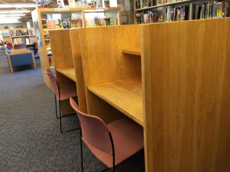 These cubicles are on their way out of the teen area at New Canaan Library, which is undergoing a refresh now. Credit: Michael Dinan
