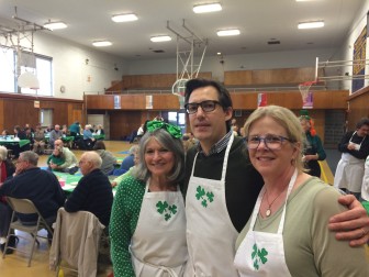 Here are three members of the Kiwanis Club of New Canaan during the organization's annual St. Patrick's Day Dinner, held March 16 at St. Aloysius School, L-R: Jenny Esposito, Doug Stewart and Stacey Hafen. Credit: Michael Dinan