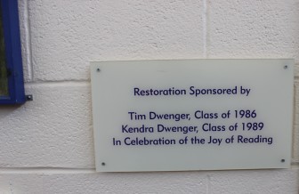 A plaque at East School recognizing the Dwenger's sponsorship.