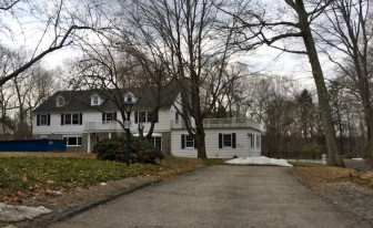 This home at 117 Fox Run Road sold for just over $1 million on March 18. The 1957 Colonial includes six bedrooms, three bathrooms and about 3,500 square feet of living space, tax records show. Credit: Michael Dinan