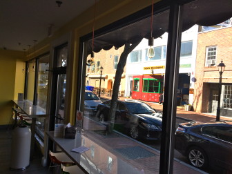 Barstools at floor-to-ceiling windows, at Peachwave on Forest Street in New Canaan.