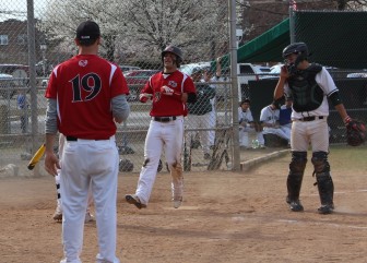 Nick Cascione crosses the plate after hitting a home run.