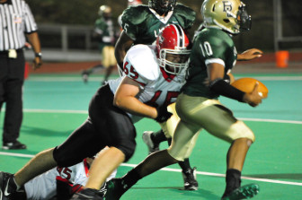 Condon with a tackle against Bassick.