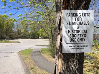 The town has signed a deal that will see construction vehicles crowding downtown lots park here, at the parking lot behind the New Canaan Historical Society and St. Michael's Lutheran Church, up on God's Acre. Credit: Michael Dinan