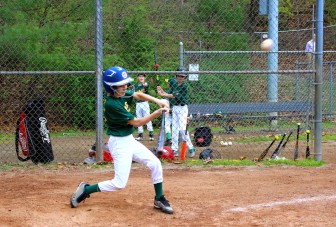 Jared Kramer of the A's connects for a double.