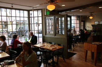 The Farmer's Table has reopened on Forest Street in a larger space with an open kitchen. Credit: Terry Dinan