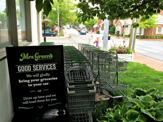 The default shopping cart storage area at Mrs. Green's on Wednesday May 28 had the carts in three rows, including on the grass at Park and Pine Streets. Credit: Michael Dinan 