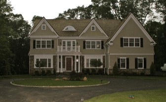 78 Norholt Drive (on a rainy day). The 2013-built, 5,308-square-foot home sits on 1.04 acres. It sold in June 2014 for $3.75 million. Credit: Terry Dinan