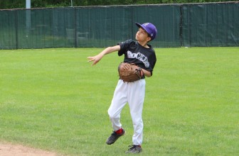 Jack Dann fires the ball back to the infield.