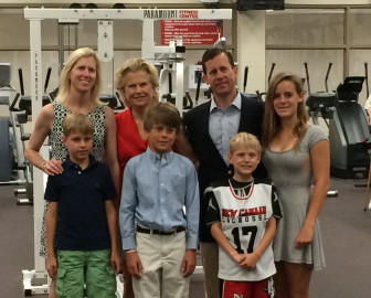 Peter Deane's family was on hand for the June 7, 2014 rededication of the Peter M. Deane Fitness Center at New Canaan High School. L-R, front row: Peter Corcoran, Griffin Deane, Chris Corcoran; back row: Carrie (Deane) Corcoran, Ingrid Deane, Pete Deane Jr. and Brooke Deane. Credit: Michael Dinan