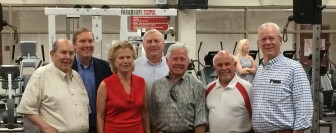 Friends (including several 1959 NCHS grads) and family gathered at the Peter M. Deane Fitness Center at New Canaan High School on June 7, 2014 for a rededication ceremony, L-R: Walter Stewart, John Dauk (son of Peter Dauk and nephew of Paul Dauk, Deane's best friend at NCHS), Ingrid Deane, Joe Rucci, Dave Elders, Skip Raymond and Mike Hobbs. Credit: Michael Dinan