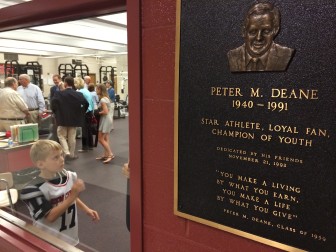 This plaque now is installed outside the fitness center at New Canaan High School. With funds raised in Peter Deane's memory and overseen by the high school's only All Sports Booster Club, the fitness center is known as one of the finest in Connecticut. New Canaan Athletic Director Jay Egan said during a June 7, 2014 ceremony: "Booster Club has continued to refurbish and resupply the equipment and when we go inside you can see that it is probably safe to say that it is still the best high school fitness center in the state, and the feedback we get from most of our athletes is even when they go off to college sometimes, the facility that they have there is not quite what they had in high school, so we’re very proud to have it and we’re very proud to have this plaque back up here so that everyone knows the story." Credit: Michael Dinan