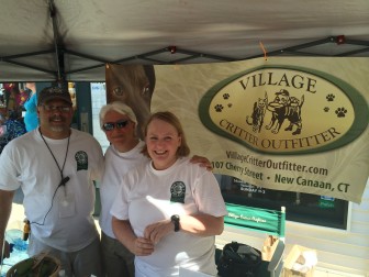 L-R: Andy Garfunkel, Village Critter Outfitter owner Shirleen Dubuque and Janet Prior at the 2014 New Canaan Dog Days, which Village Critter Outfitter presents. Garfunkel and Prior are volunteers for the event. Credit: Michael Dinan