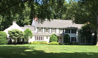 This 1961 Colonial at 85 Fable Farm Road sits on 2.01 acres. It sold in June 2014 for $2,075,000. Credit: Michael Dinan