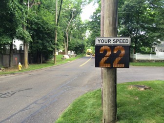 After residents requested traffic-calming on Parade Hill Road, town officials set out to collect data and do what they could to ensure safety. In addition to selected enforcement, officials from the Traffic Calming Work Group set up this speed sentry which tells motorists how fast they're traveling and collects data on their speeds. Credit: Michael Dinan