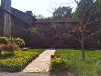 This 1955, 2-story Colonial at 166 West Road includes 7,258 square feet of living space on a three-acre lot. it sold in July 2014 for $2.85 million. Credit: Michael Dinan