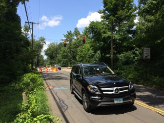 This week saw the start of alternating one-way traffic at Ponus Ridge and the Merritt Parkway, while the state DOT completes roadway and bridge work there. The project is expected to last through next September, officials say. Credit: Michael Dinan