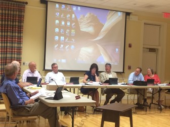 The Town Council at a July 16 special meeting, held in the Douglas Room at Lapham Community Center. Credit: Michael Dinan