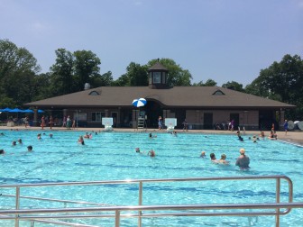 Poolside view of the Waveny Pool on a sunny Tuesday in July.