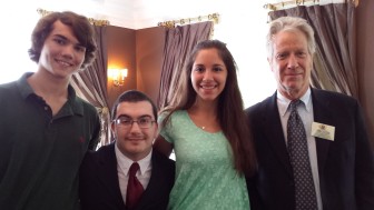 Kiwanis Treasurer Jerry Miller presents three of the five Kiwanis Scholarship recipients for 2014. From left to right: Eugene Constandaki, Samuel Kramer, Lauren Perone, and Jerry Miller. Contributed photo