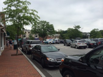 Cars regularly park nose-to-nose at Morse Court in New Canaan, typically because motorists pulling off of South Avenue pull to the left to parallel-park along the row of shops. Credit: Michael Dinan