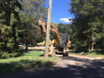 The wrecking ball made quick work of the 57-year-old Cape Cod-style home on this 2-acre property at 77 Woodridge Drive. It isn't clear what's planned for the lot. Credit: Michael Dinan