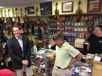 U.S. Rep. Jim Himes (D-4) chats with New Canaan Music's Phil Williams and Jim O'Neill on Aug. 22. Credit: Michael Dinan
