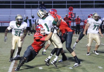 Parker Lynch (#77) and Zach Allen (#44) combine on a hit. (Terry Dinan photo)