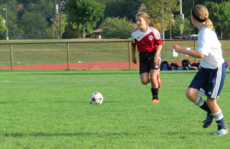 New Canaan's Madeleine McLaughlin confidently controls the ball for the U11 Girls Red team. Contributed photo