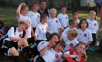 The New Canaan Boys U9 Red Team celebrates after winning their game against Old Greenwich.   Front row: Connor Lytle, Henry Silva.  Next Row: Augusto Baldini, Jack Cudo.  Next row:  Ben Bilden, Felipe Galavis.  Rest of team from left to right:  Will Langford, Teddy Hoffstein, Ted Werner, Teddy Balkind, Max Lowe, Cole Wilson, Jaden Oyekanmi. Contributed photo