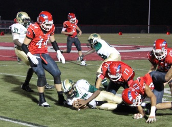 Zach Allen (#44), Parker Lynch (#77) and Sterling O'Hara (#43) with a stop. (Terry Dinan photo)