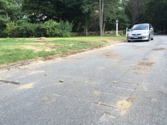 Another look at the road damaged in the area of 131 Soundview Lane. Credit: Michael Dinan