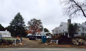 Construction is underway at the lot formerly known as just 809 Weed St., now four lots. The Lagardes' home can be seen in the back. Credit: Michael Dinan