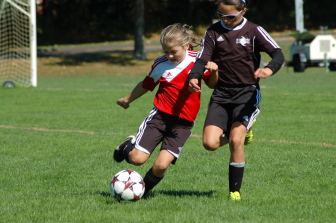 New Canaan defender Kate Caione shuts down the Stamford offense for the New Canaan Soccer Association U10 Red Team. Contributed photo 