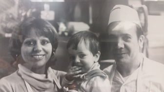 One of this year's sponsors of the Rec Department's "Breakfast with Santa" is Lorenzo Colella—pictured here as a New Canaan tot himself with his parents, Annunziata and Joe—the founder of Joe's Pizza, now operated by Lorenzo on Locust Avenue. Contributed photo