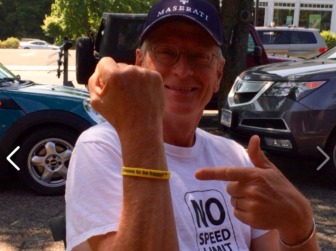 Peter "The Bushman" Bush, longtime FM 95.9 The Fox DJ, with his Choose To Be Happy bracelet. Contributed