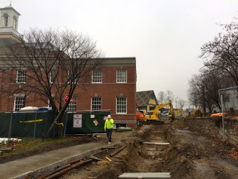 The 5-by-5-foot trench that will house new lines from the water main in Main Street, running to the renovated Town Hall and Outback Teen Center. Credit: Michael Dinan
