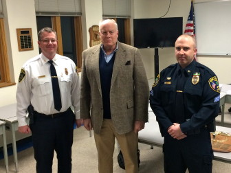 Police Chief Leon Krolikowski, Rob Perkin and Sgt. Andrew Walsh, winner of the Commissioners' Shoot Award, at the Dec. 17 Police Commission meeting, in the Training Room at the New Canaan Police Department. Credit: Michael Dinan