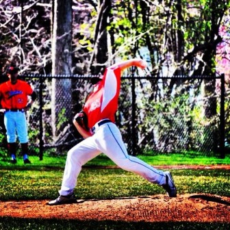 NCHS student Ronnie Roganti pitching for JV last season. Contributed