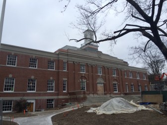 Part of the Town Hall renovation has involved restoring the precast concrete bands that separate each floor and as well as its pediment—the parapet just above the front of the building in the center. This photo snapped Jan. 14, 2015. Credit: Michael Dinan