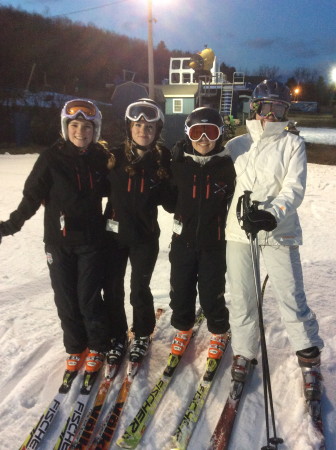 Left to right: NCHS varsity ski team members Megan Waldron, co-captain Amanda Dobbin, co-captain Emily DeTour, and Siri Thorbeck take a break during a recent training session at Mount Southington. Contributed photo