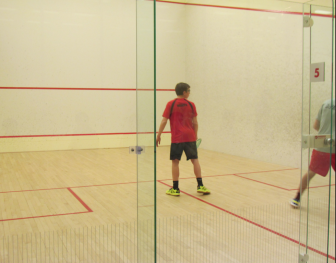 New Canaan High School varsity A squash player Hal Holappa defeated Rye High School's John DiPalma 12-10, 11-4, 11-2 on Jan. 21. Contributed photo