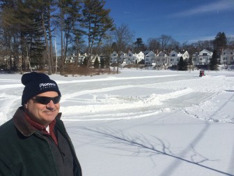 Parks Superintendent John Howe is overseeing the clearing of snow from Mead Pond on Feb. 18, 2015—it'll be the first time in six years that we've had ice skating on the pond. Lights will illuminate the ice through 10 p.m. Credit: Michael Dinan