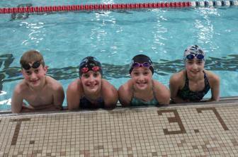 New Canaan YMCA Caimans will send 5 team members to represent Connecticut in the Eastern Zone SC Age Group Championships (left to right): Bennett Ehret, Catherine Steinberg, Julia Cassone, Kaylana Couture