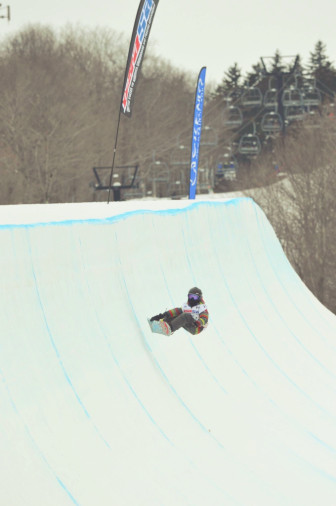 Sumner doing a front side indie grab in the Half Pipe at Okemo Mountain. Credit: Christopher Landon