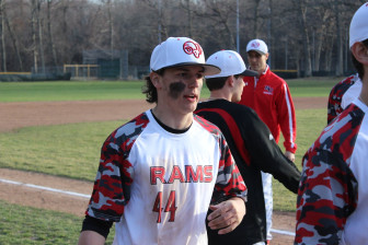 New Canaan Rams co-captain David Giusti. Assistant coach Chris Silvestri with the photo bomb. Credit: Terry Dinan